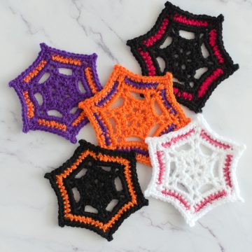 Five spiderweb coasters.