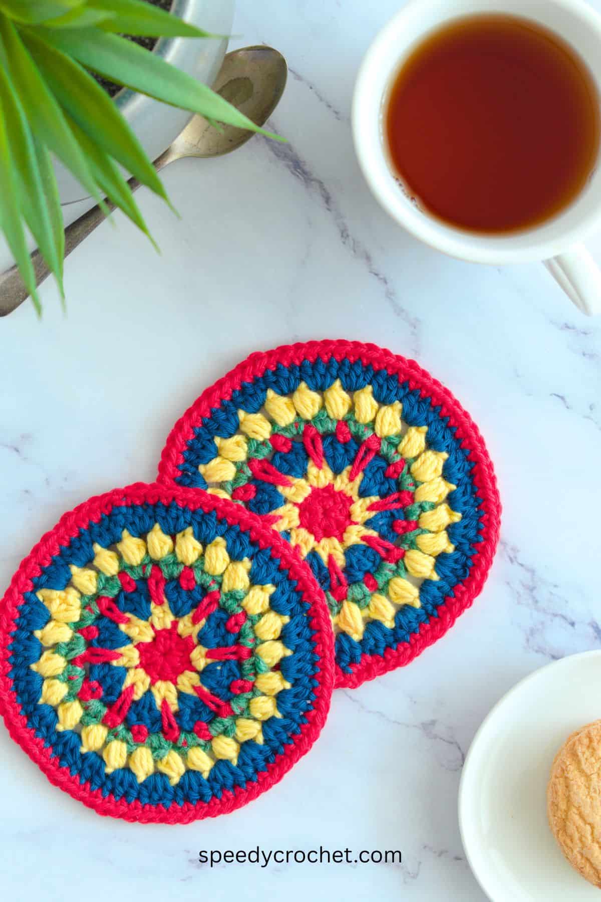 Multi colored crochet coasters.