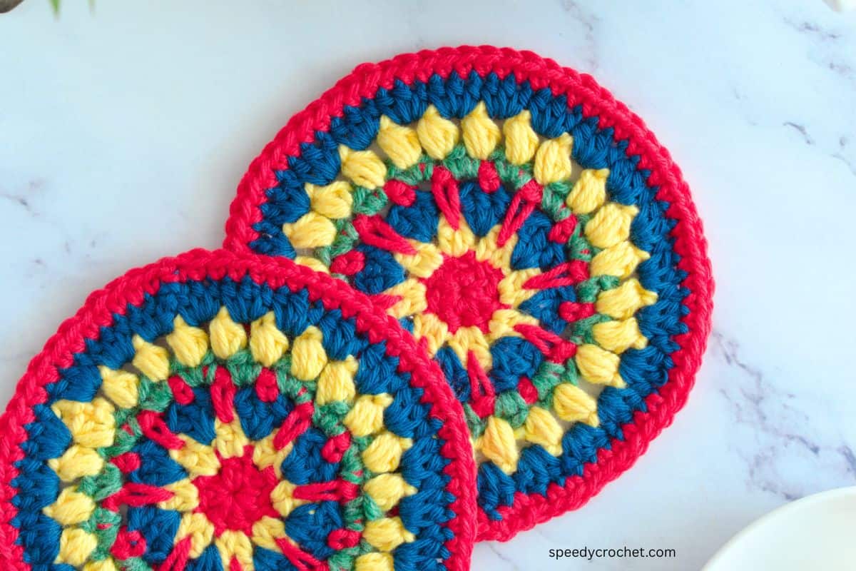 A closeup view of crochet coasters.