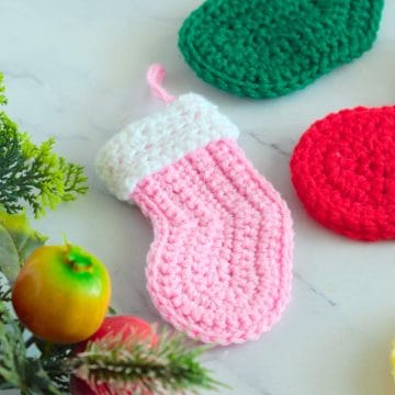 Pink crochet stocking ornament.