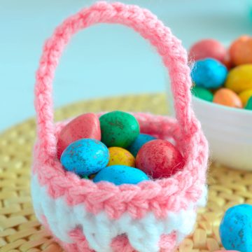 A small pink crochet basket.