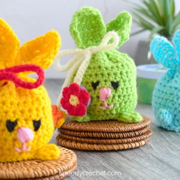 Three crochet bunny pouches.