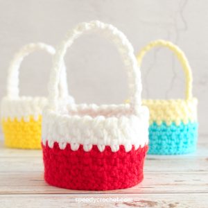 Three crochet baskets.