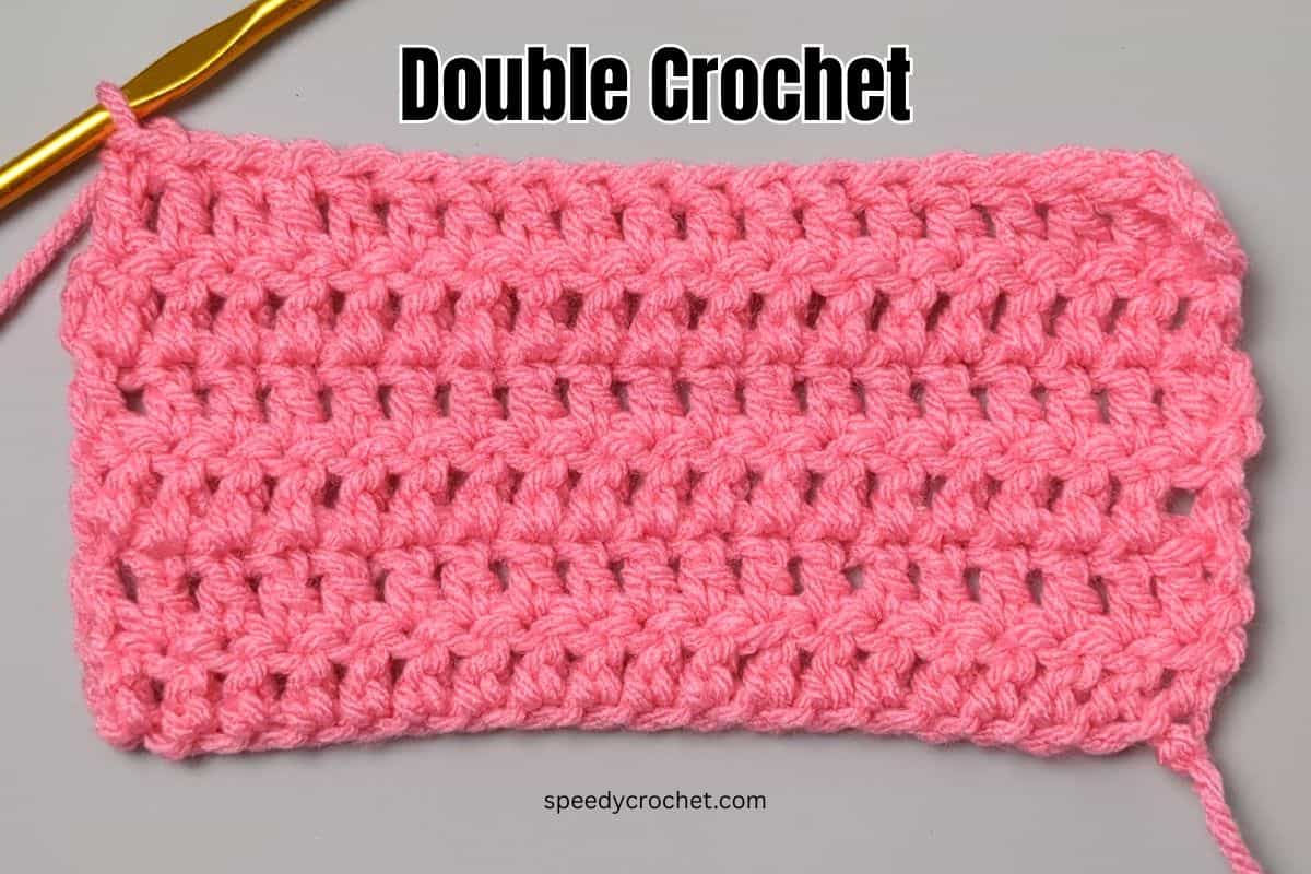 Double crochet stitches in pink yarn.