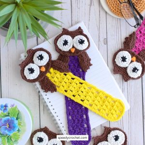 Yellow and purple crochet owl bookmarks.