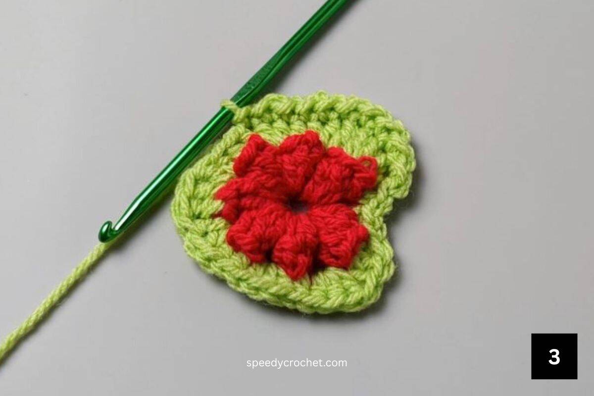Image showing the border on a three crochet crochet heart applique.