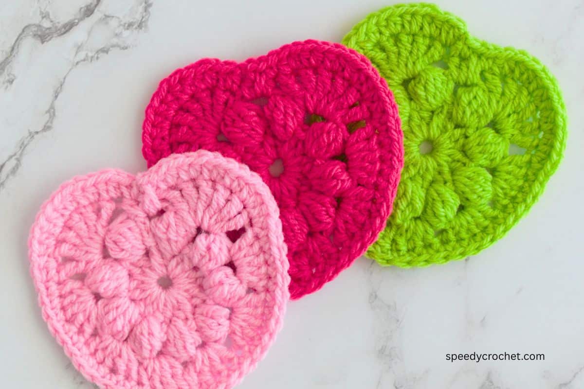Three crochet hearts.
