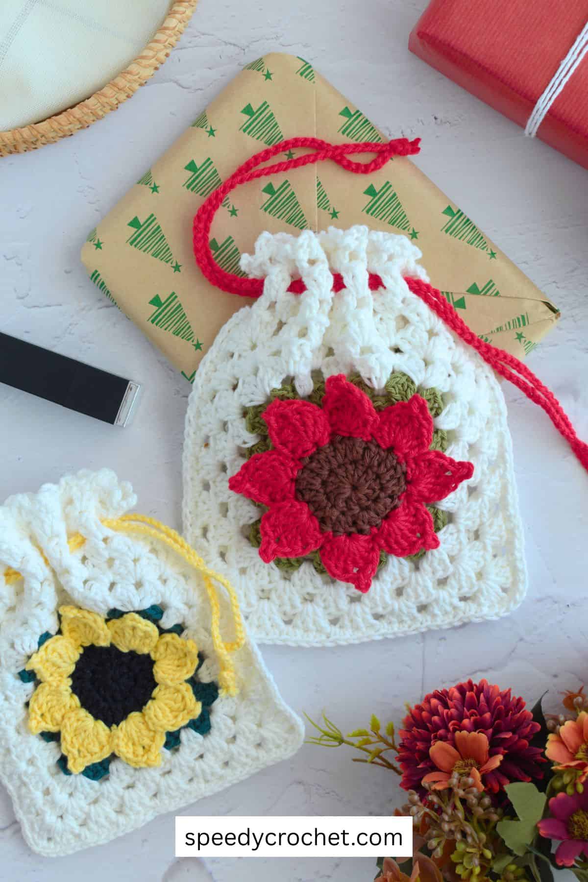 Two crochet sunflower bags.