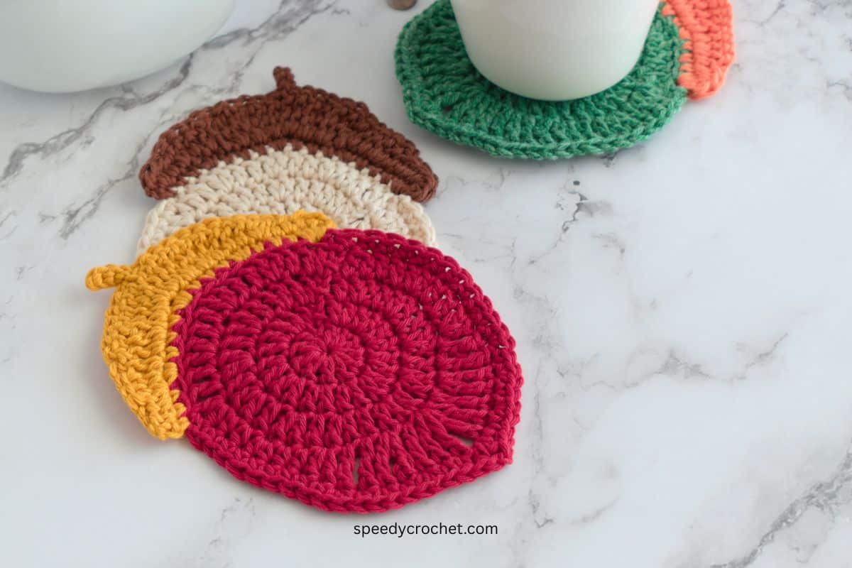 Crochet acorn coasters.