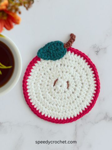 Crochet apple coaster.