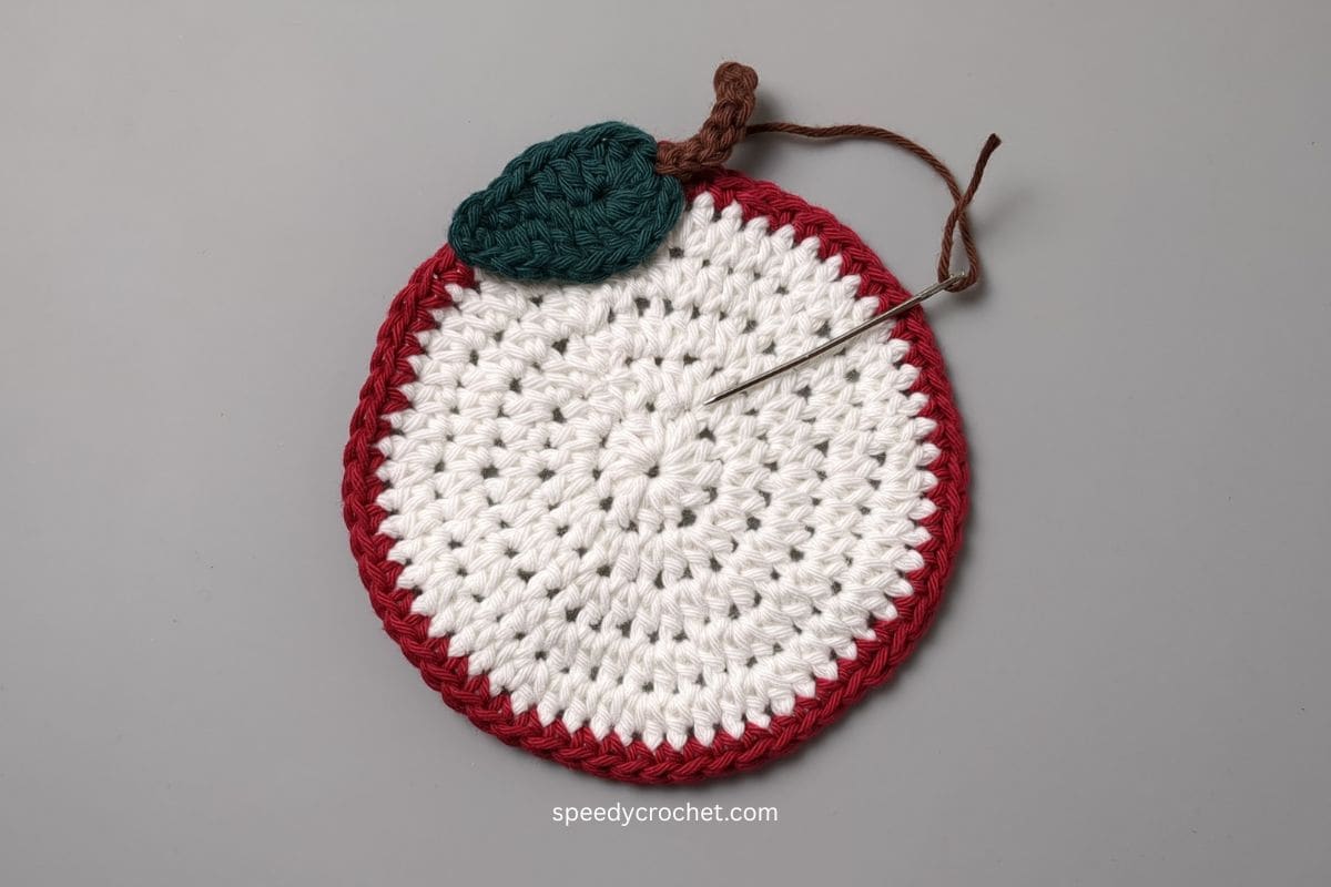 Crochet apple coaster,