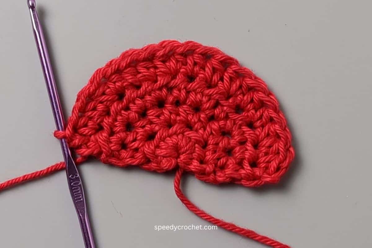 Red half crochet circle.
