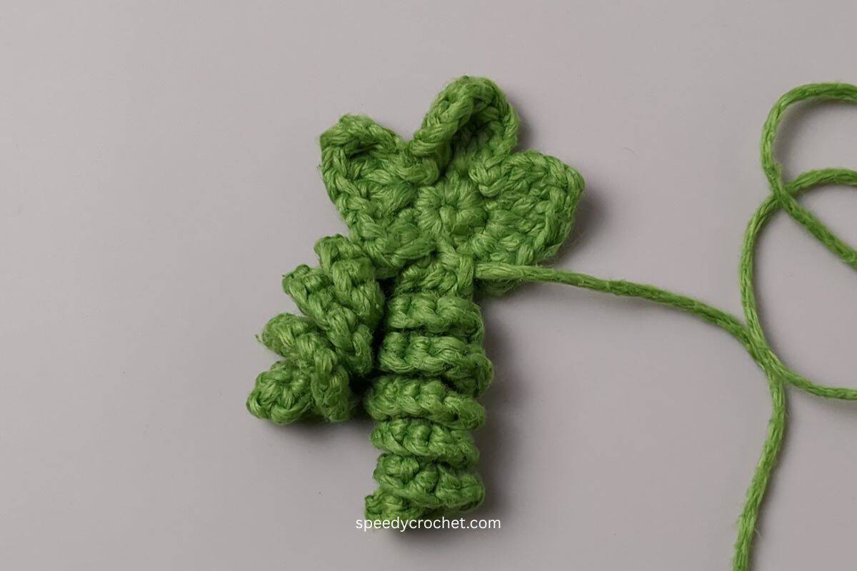 Crochet pumpkin leaf and tendrils.
