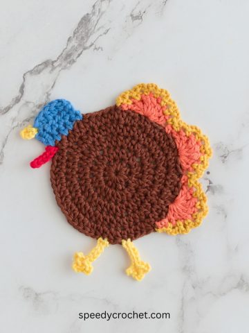 Crochet turkey coaster.